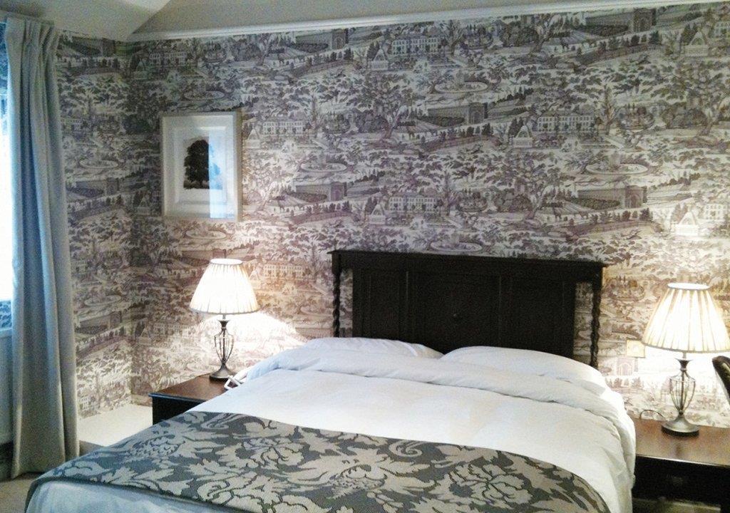 The Fleece At Cirencester Pokoj fotografie A bedroom at the hotel