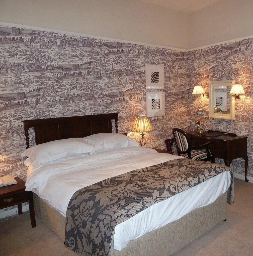 The Fleece At Cirencester Pokoj fotografie A bedroom at the hotel