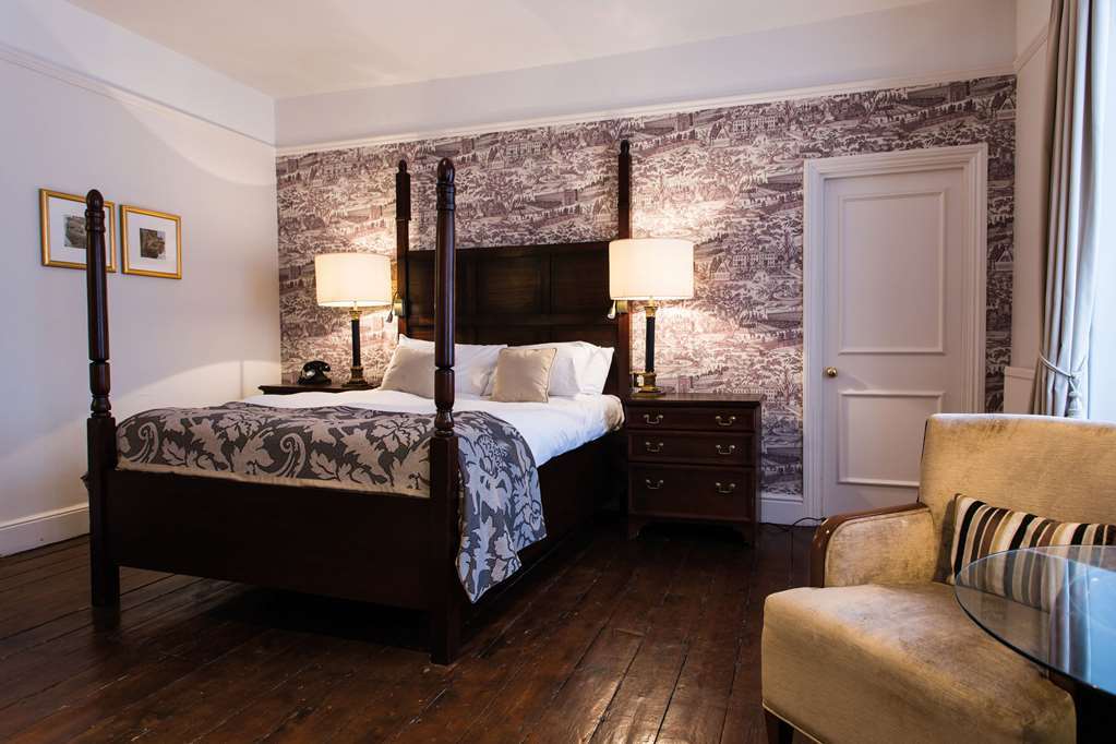 The Fleece At Cirencester Pokoj fotografie A bedroom at the hotel